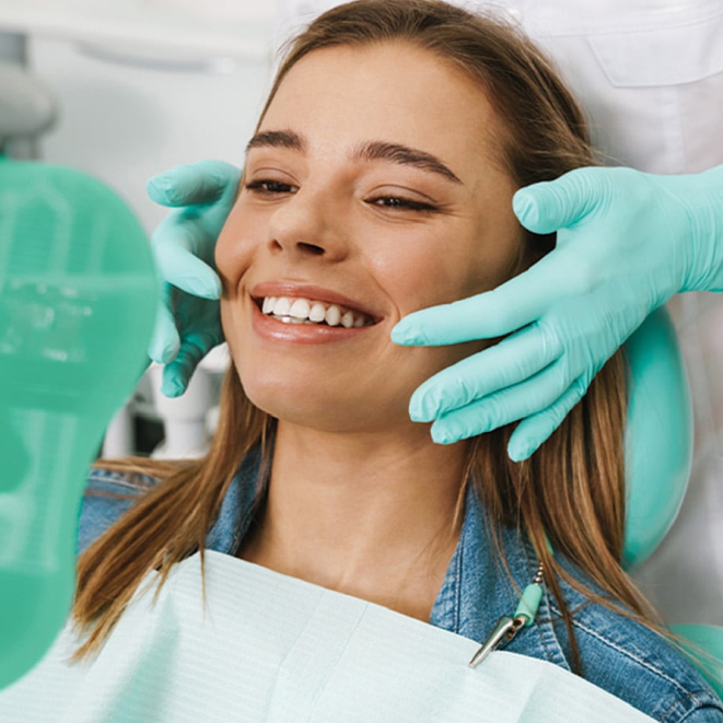 Smiling Dental Patient During Exam